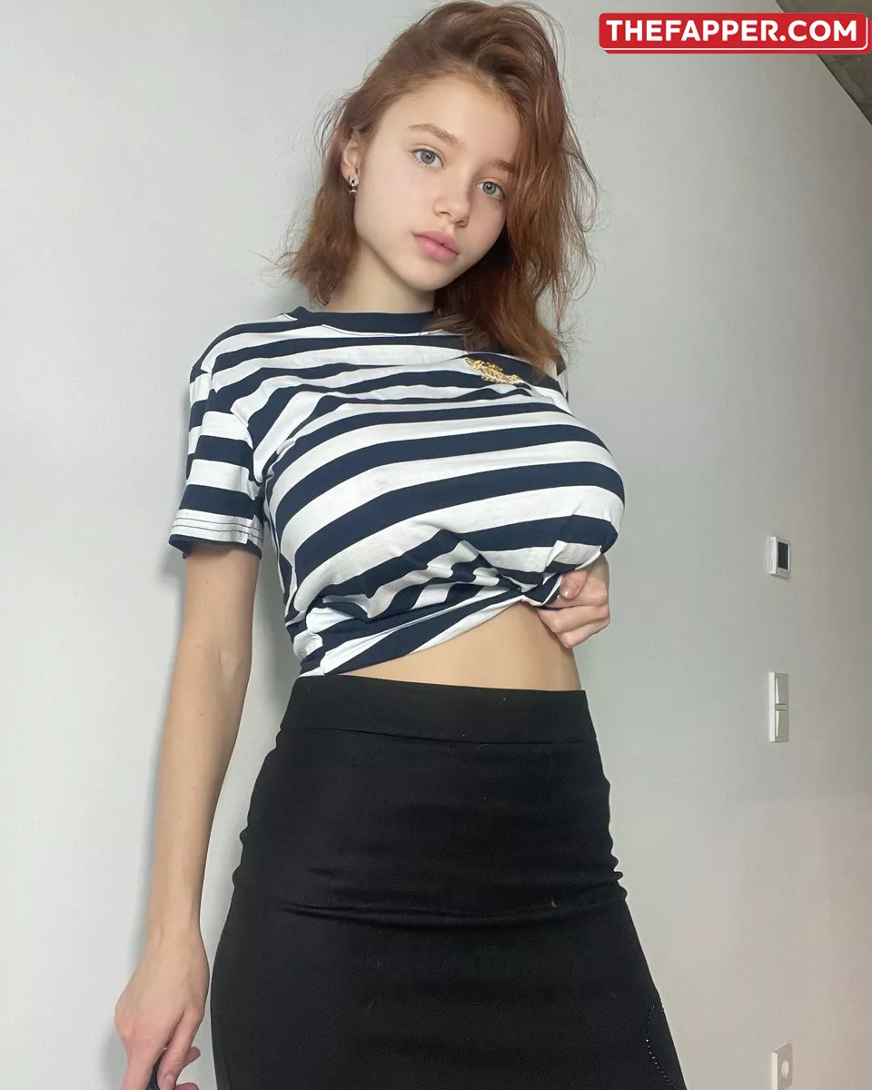 Adorable Girl Teases With Her Large Tits In A Sultry Collection Of Clothing #1