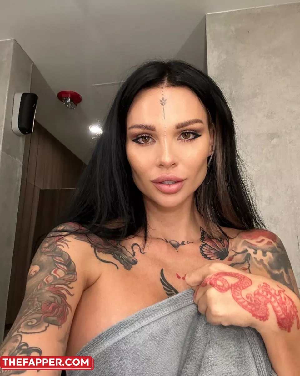 Sunny Free An Inked OnlyFans Model Shows Off Her Huge Tits And Ass In A Solo #2