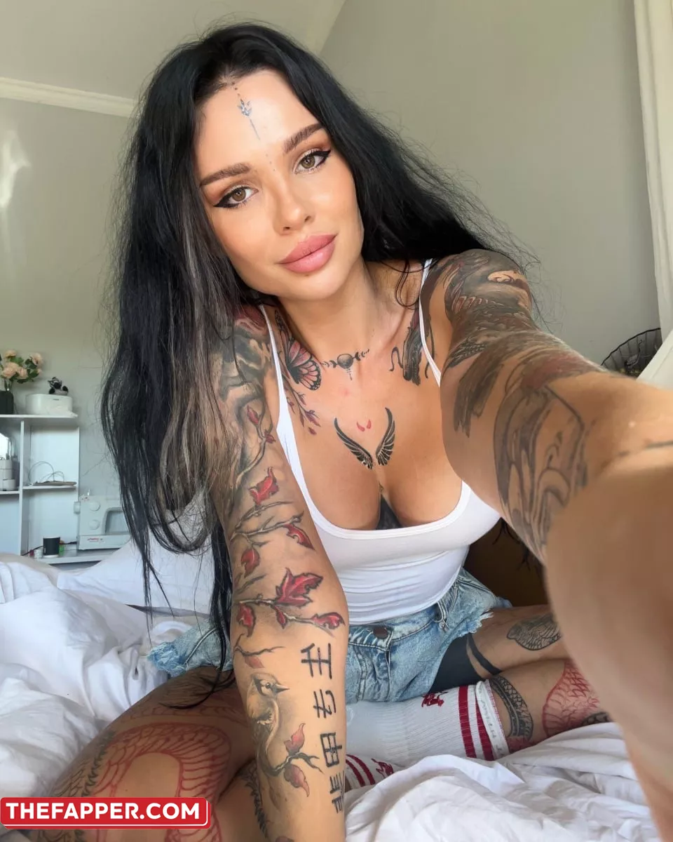 OnlyFans Bimbo Sunny Free Teases Her Large Breasts And Inked Body #3